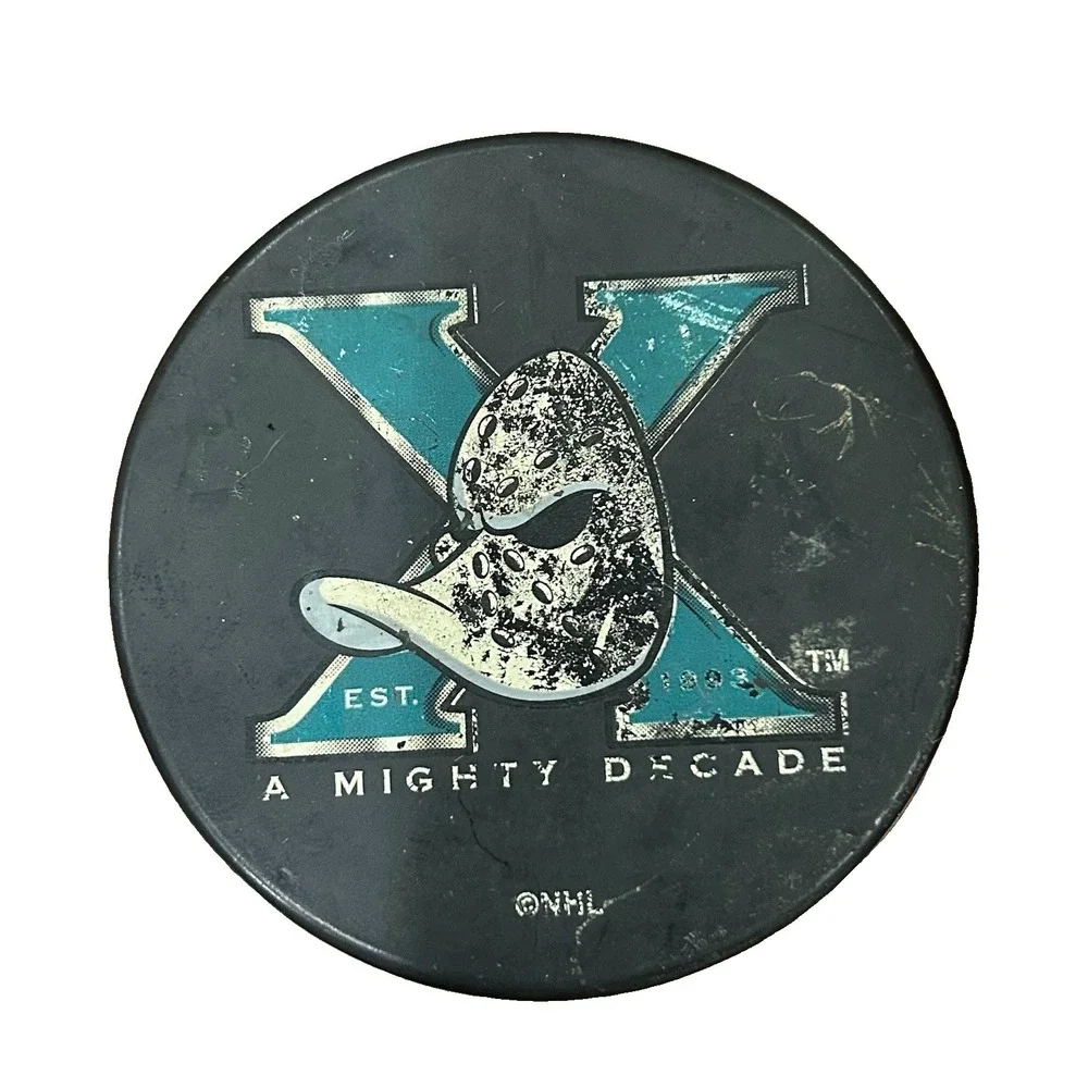 EST. 1993 VINTAGE A MIGHTY DECADE MIGHTY DUCKS NHL AAA & ESPN SPONSOR PUCK